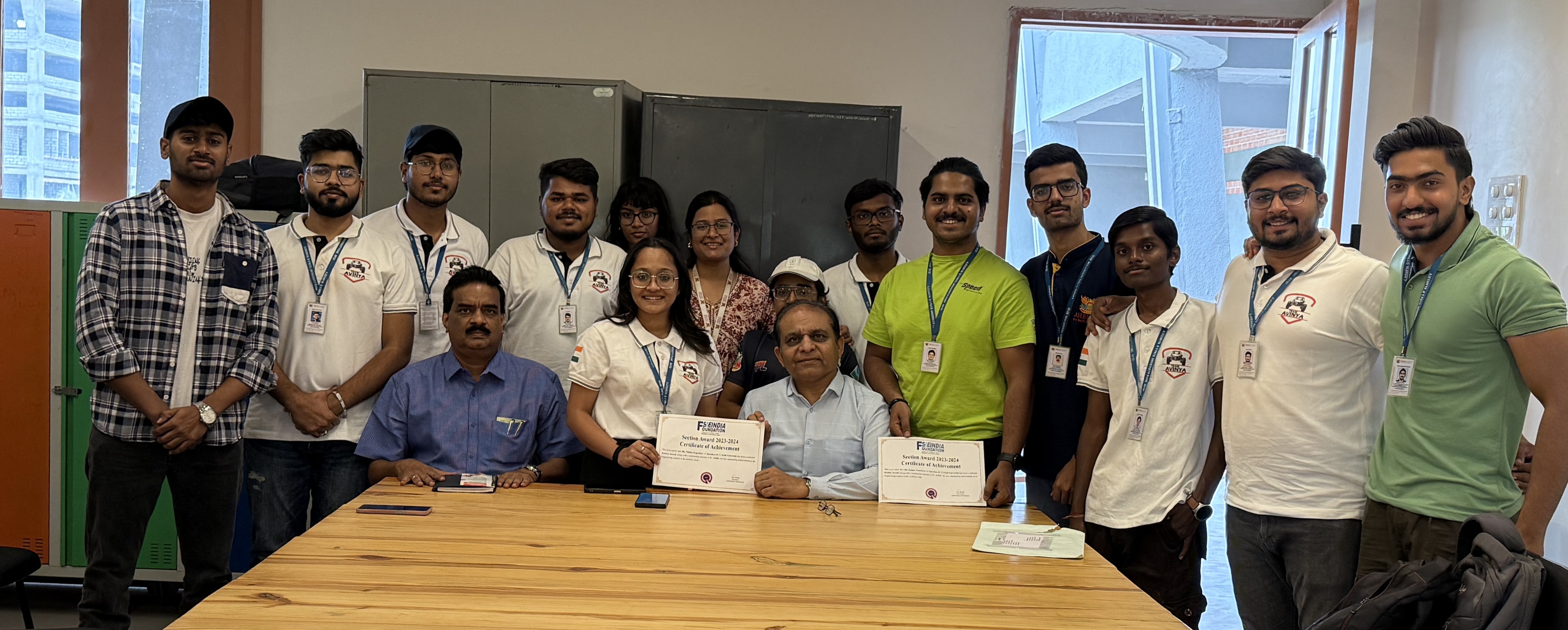 Team Avinya members receiving sponsorship support for the project